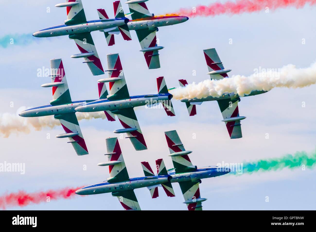 Frecce tricolori national Italian aerobatic group dangerous risky crossing during Airpower Zeltweg 2016 airshow in Austria perfect timing moment Stock Photo