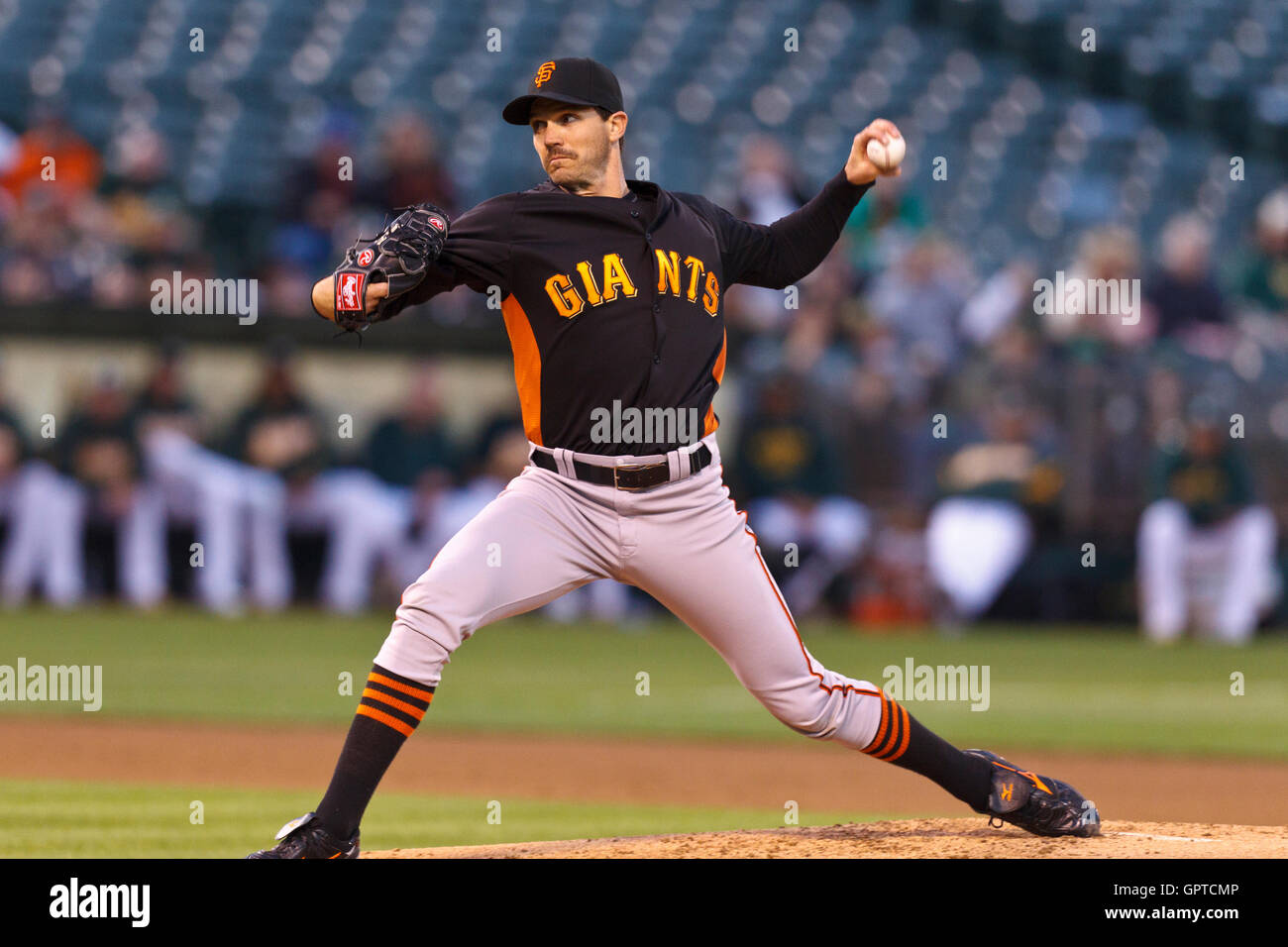 March 29, 2011; Oakland, CA, USA;  San Francisco Giants starting pitcher Barry Zito (75) pitches against the Oakland Athletics during the first inning at Oakland-Alameda County Coliseum. Stock Photo