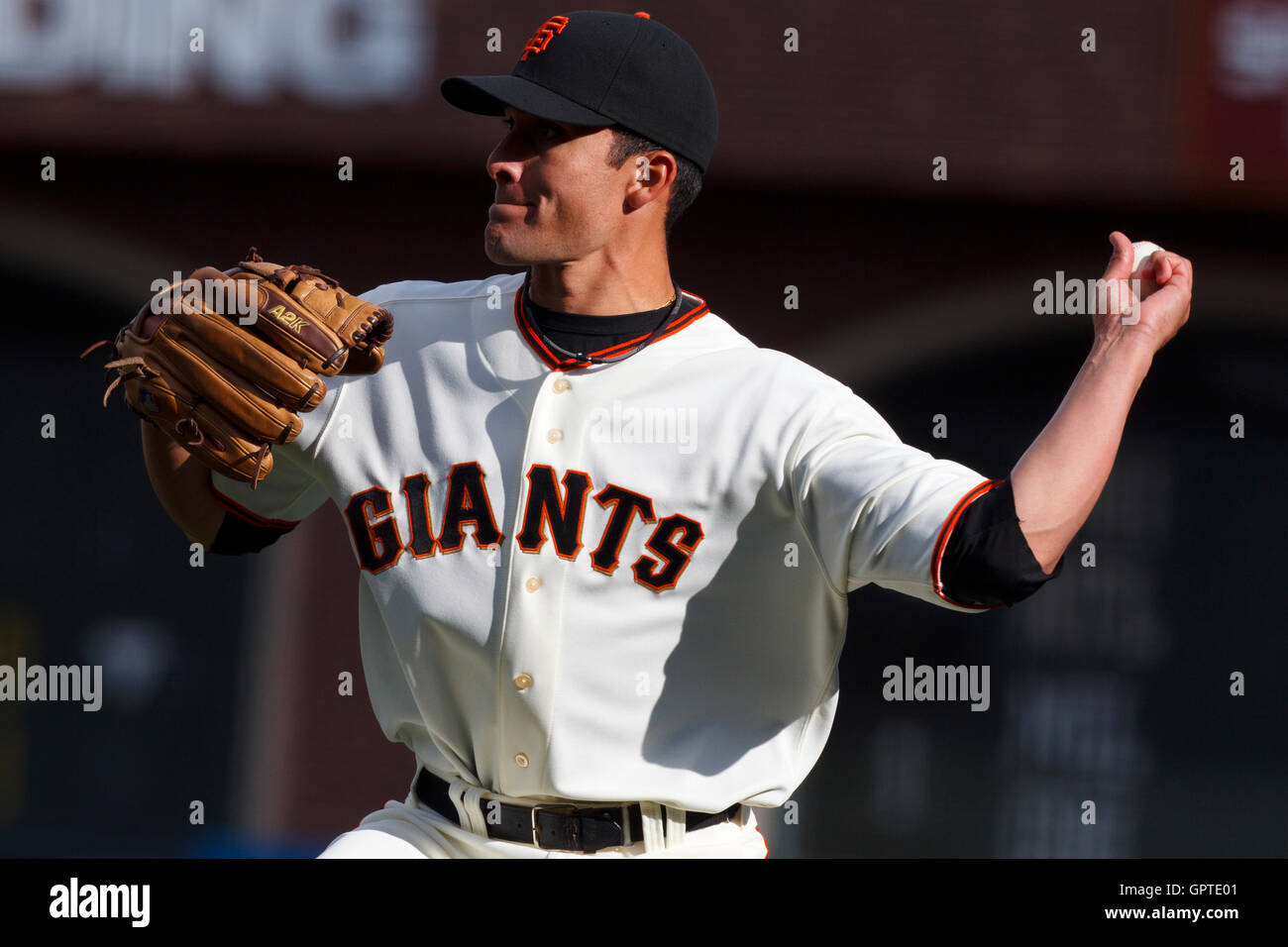 April 8, 2011; San Francisco, CA, USA;  San Francisco Giants relief pitcher Javier Lopez (49) throws to third base to force an out against the St. Louis Cardinals during the eleventh inning at AT&T Park. Stock Photo