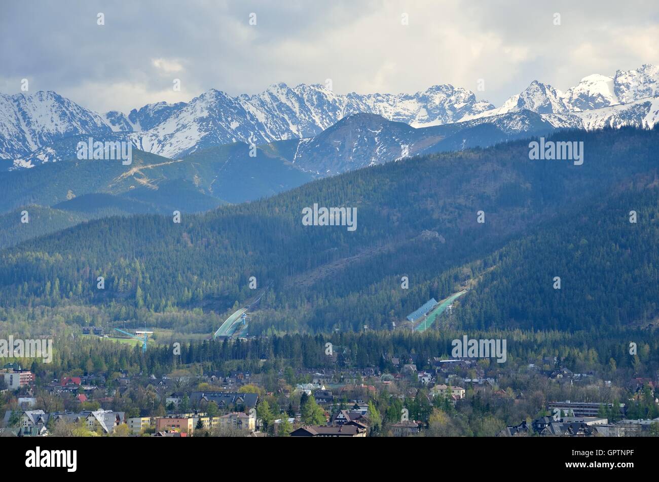 Spring mountain landscape. View on the Zakopane Town and High Tatra Mountains, Poland. Stock Photo