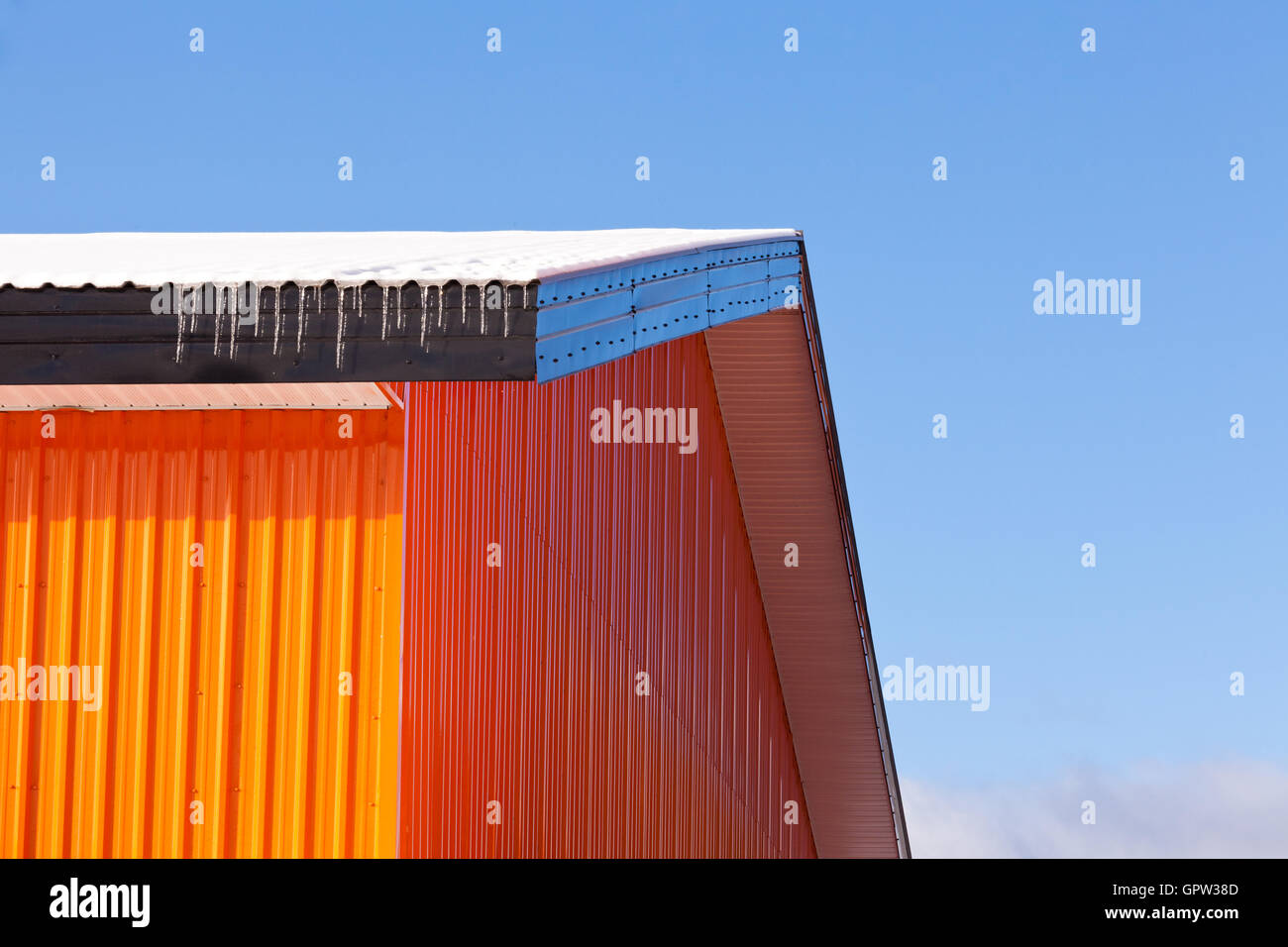 Orange metal sheet siding warehouse construction Stock Photo Alamy