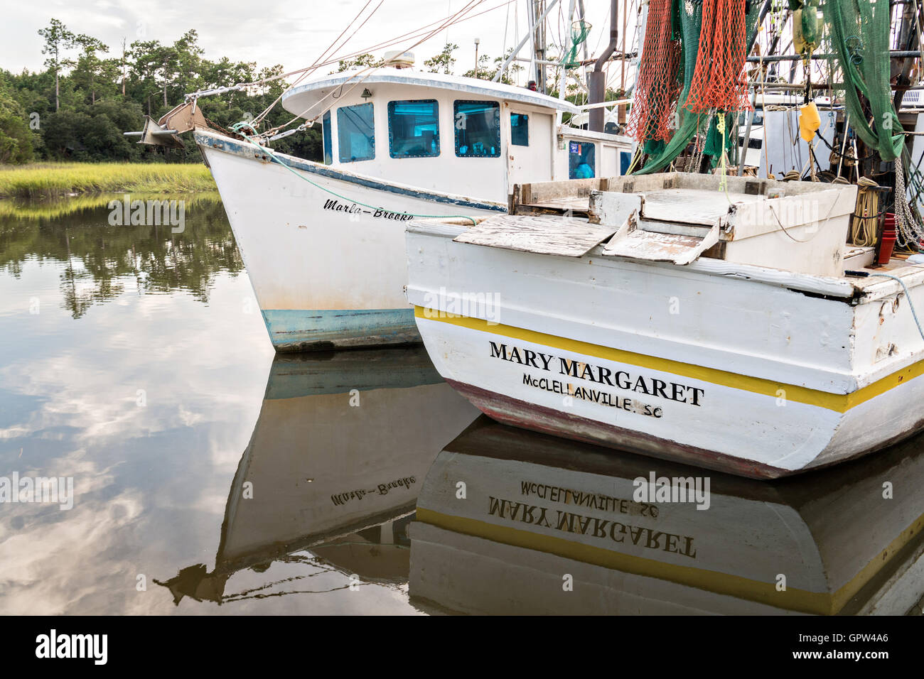 Shrimp boats tied up at the docks along Jeremy Creek in the village of