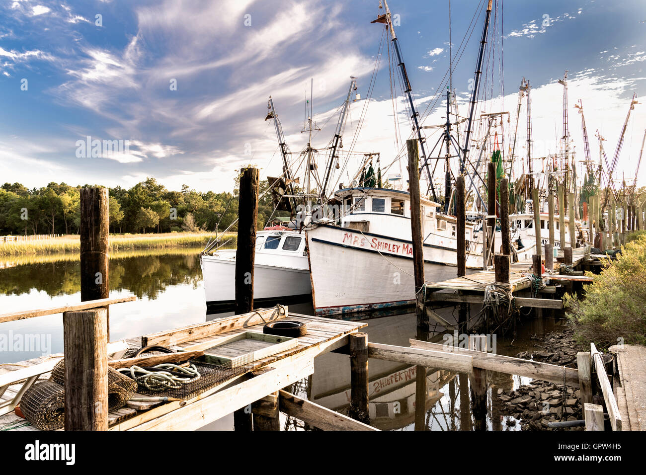 Shrimp boats tied up at the docks along Jeremy Creek in the village of