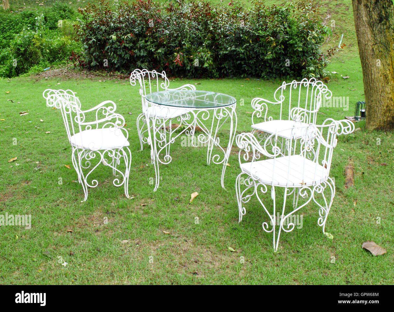 white table and chairs Stock Photo - Alamy