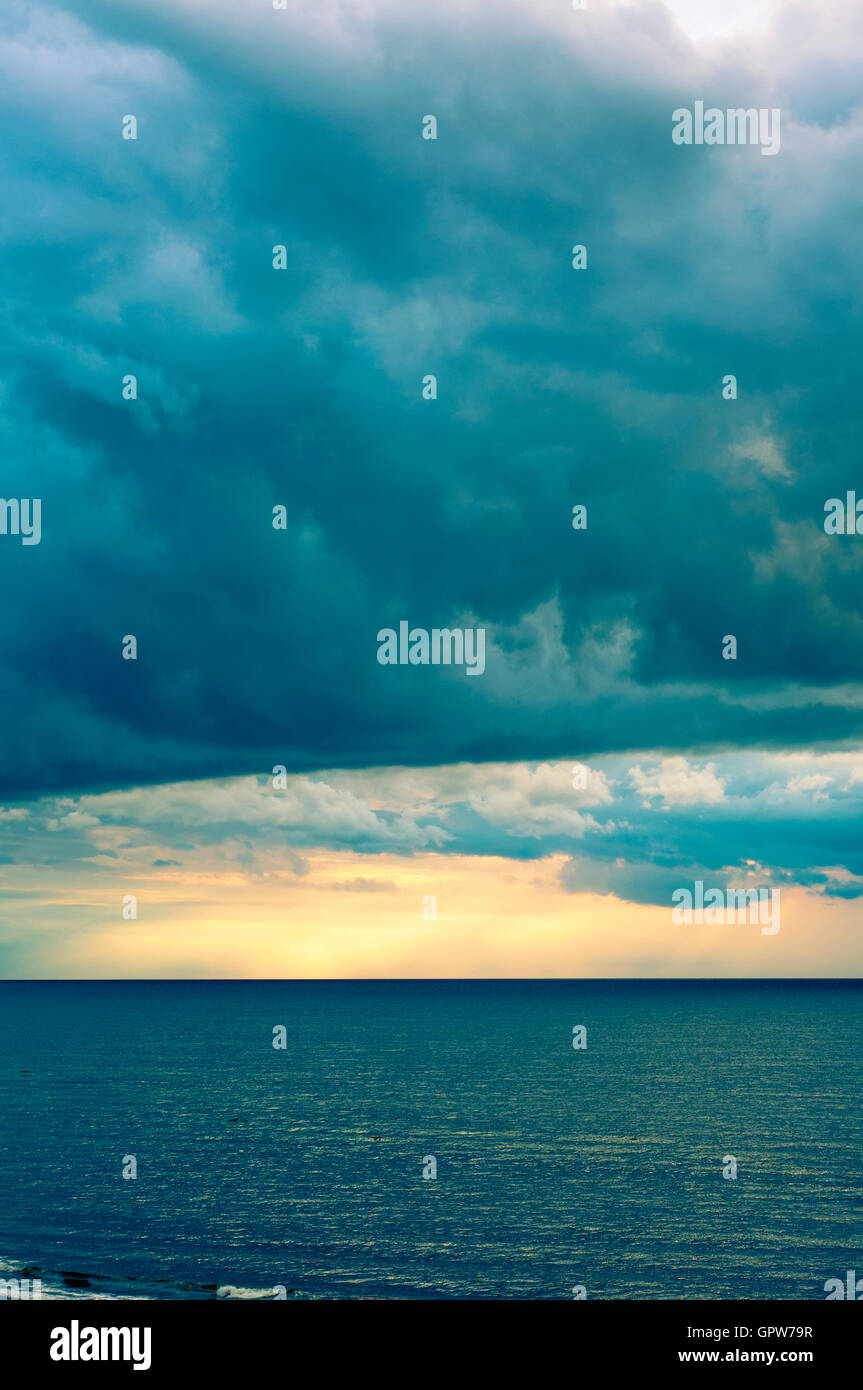 Dark clouds over the sea Stock Photo - Alamy