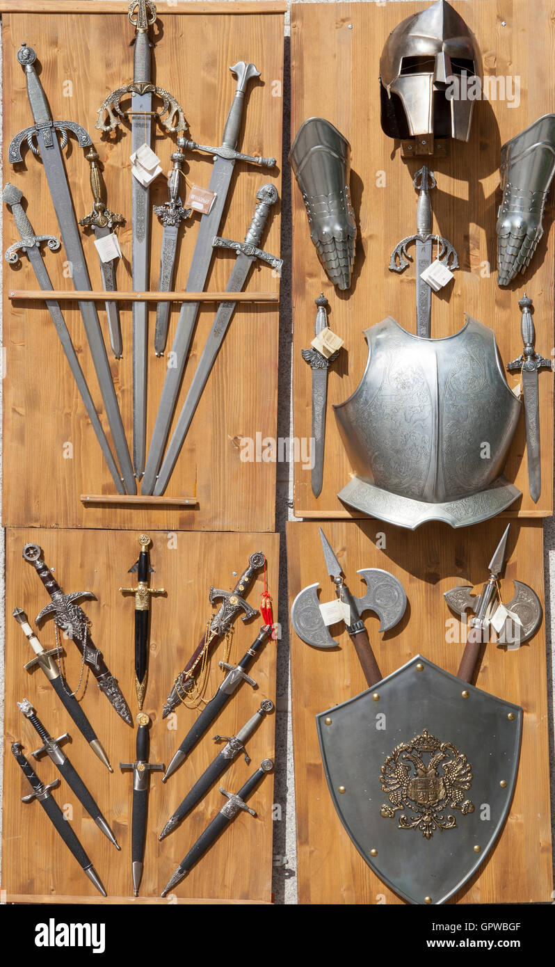 Toledo, Spain - August 28, 2016: Armor, knives, and swords. Toledo is historically known for its production of medieval steel we Stock Photo