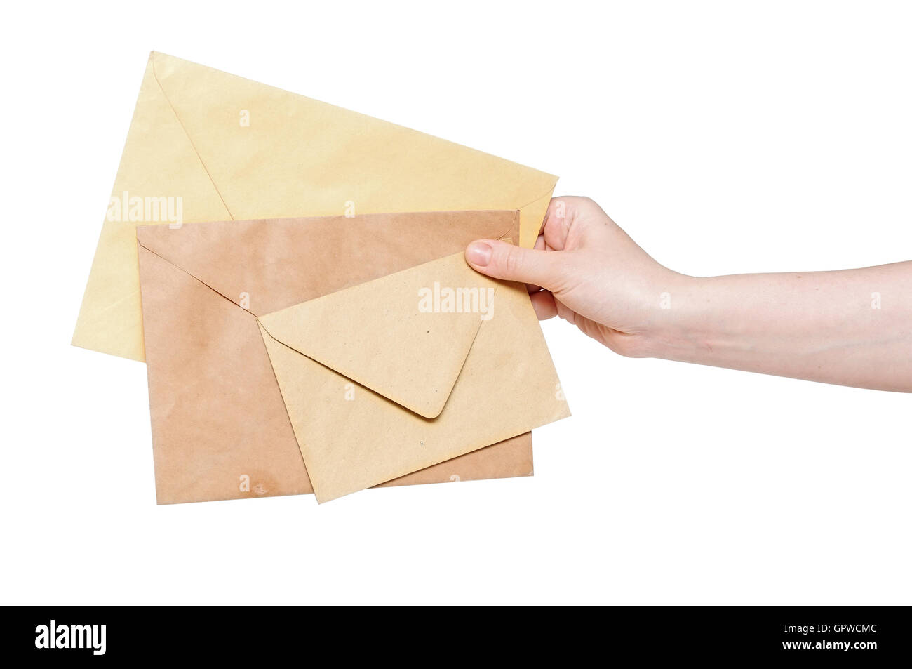 yellow envelopes in the hand isolated on white background Stock Photo ...