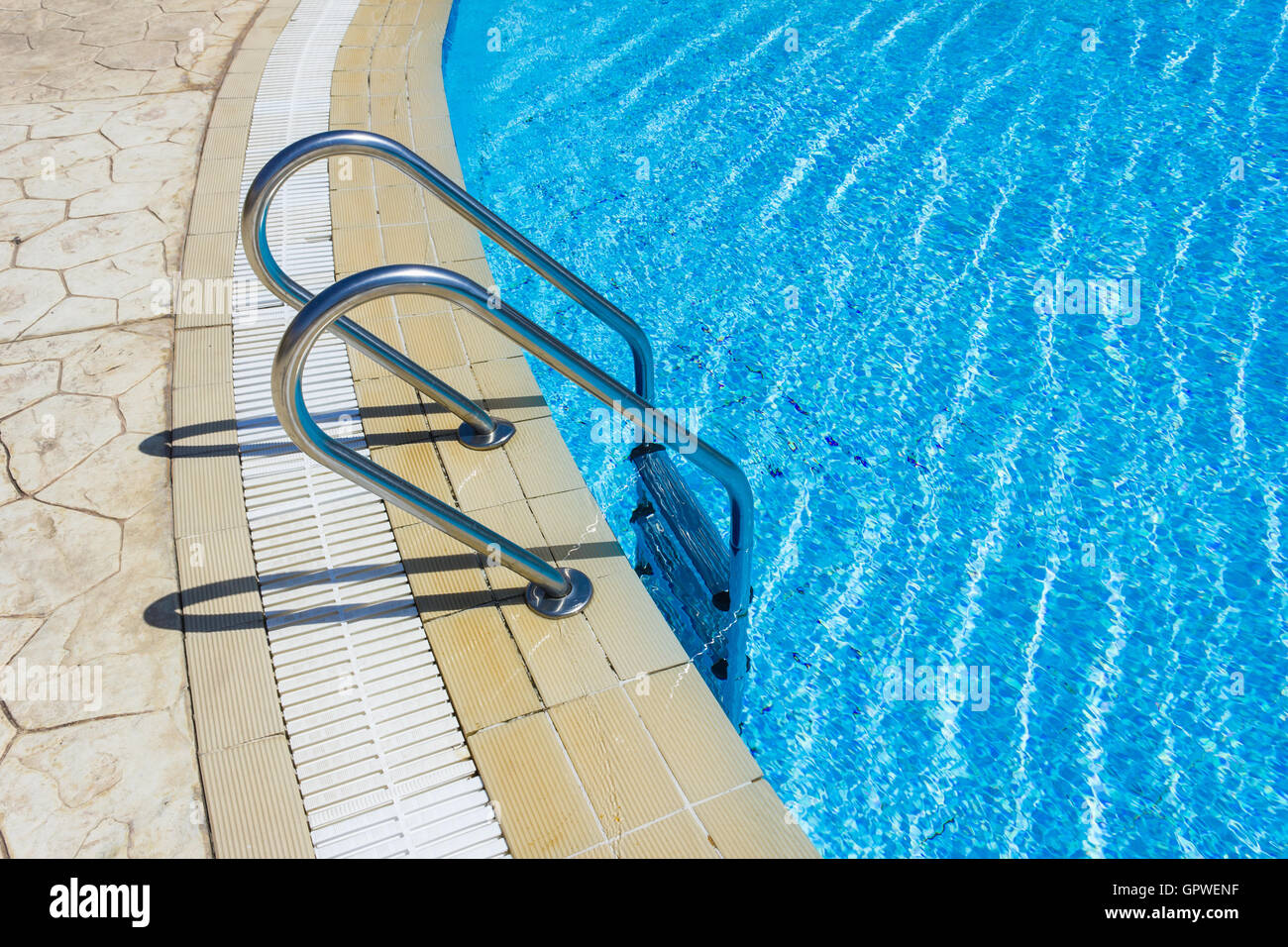 Grab bars ladder in the swimming pool Stock Photo Alamy