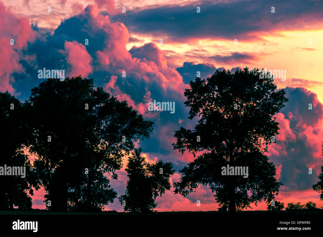 Dark sky with storm clouds during sunset Stock Photo - Alamy