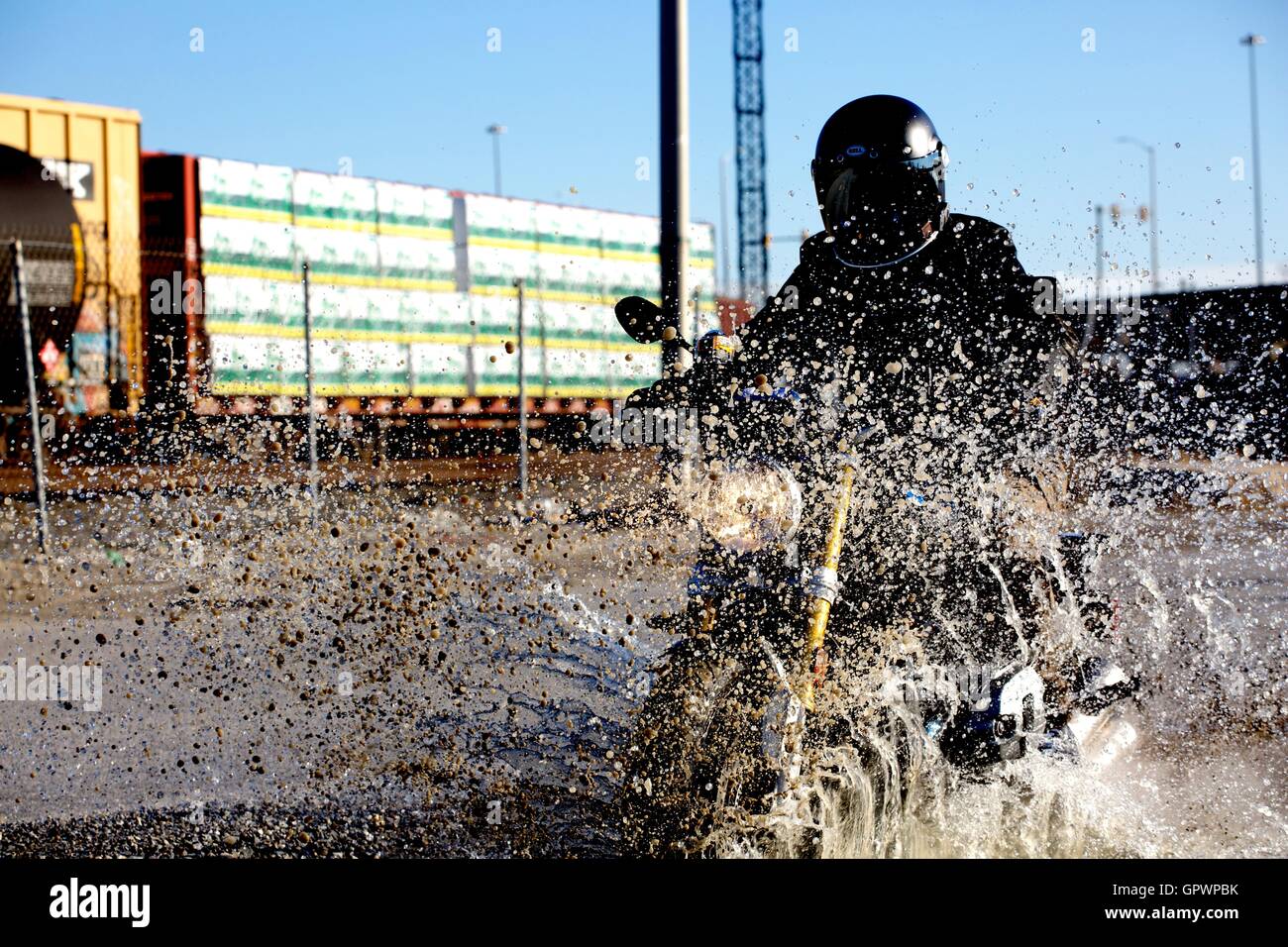 A BMW R Nine T riding through the shipyards of Baltimore Stock Photo ...