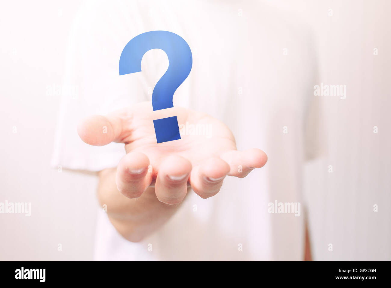 Male hand with question mark, selective focus Stock Photo