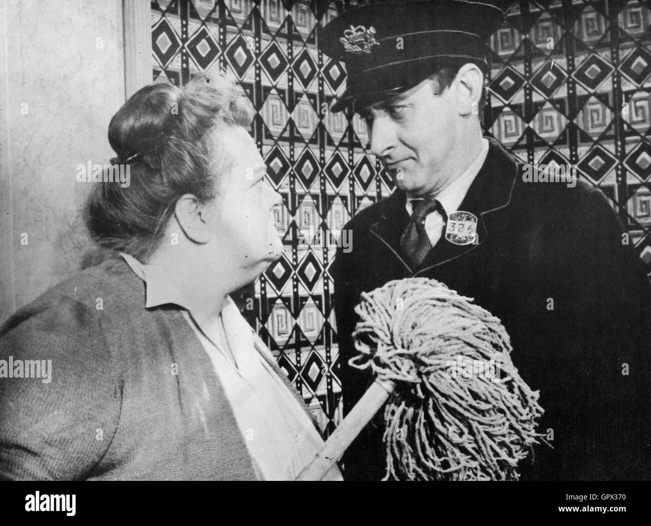 POSTMAN'S KNOCK 1962 MGM film with Spike Milligan and Peggy Ann Clifford Stock Photo