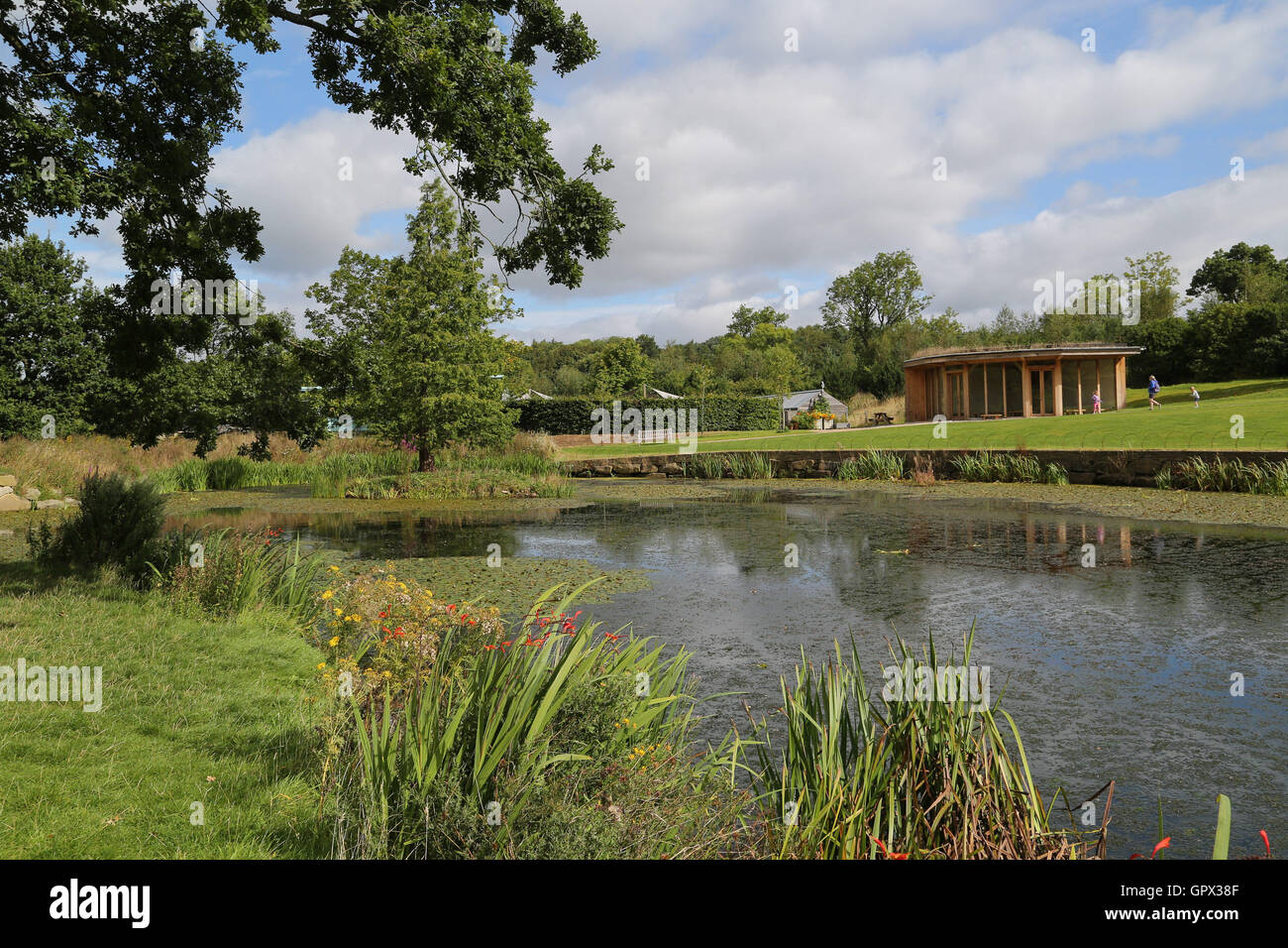 Harrogate, UK. The Queen Mother's lake at RHS Garden Harlow Carr in Harrogate, North Yorkshire. Today marks the first day of aut Stock Photo