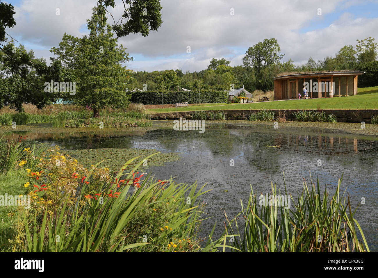 Harrogate, UK. The Queen Mother's lake at RHS Garden Harlow Carr in Harrogate, North Yorkshire. Today marks the first day of aut Stock Photo