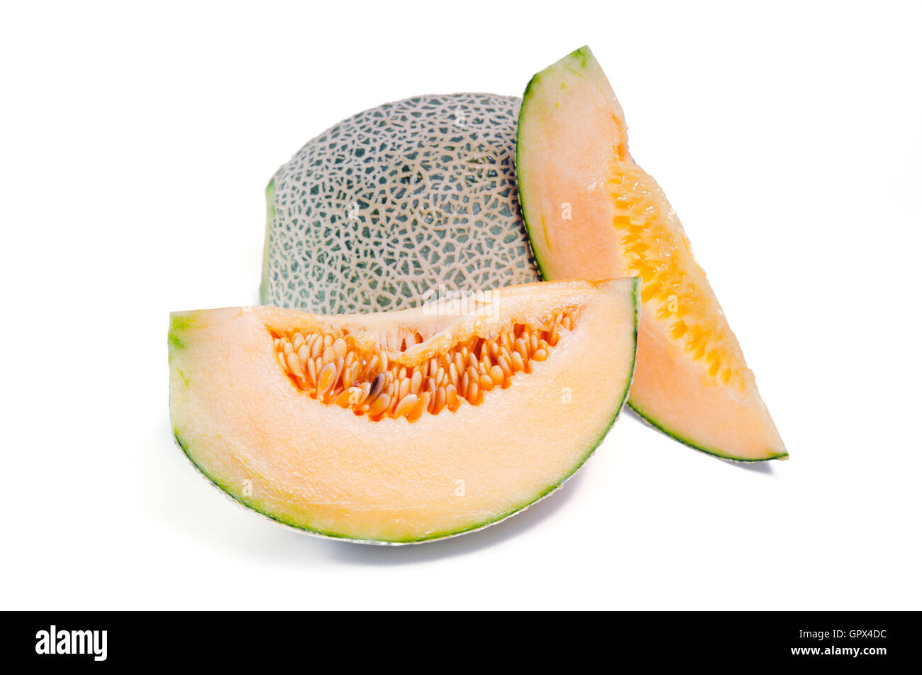 Melon or cantaloupe sliced on white with seeds (Also called as