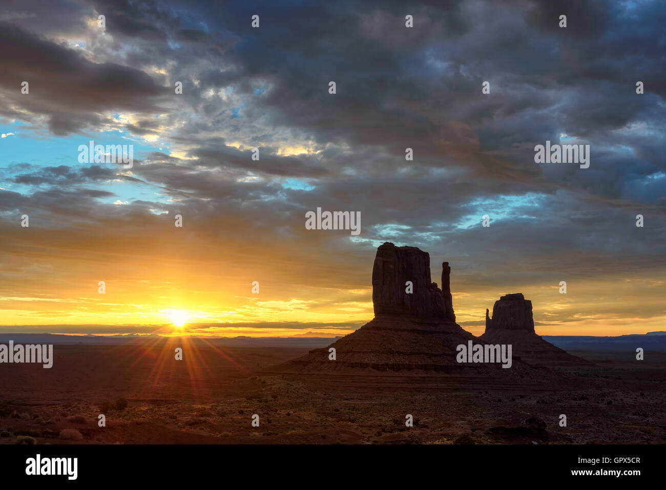 West Mitten Butte and East Mitten Butte at Sunrise in Monument Valley Navajo Tribal Park, Arizona, USA Stock Photo