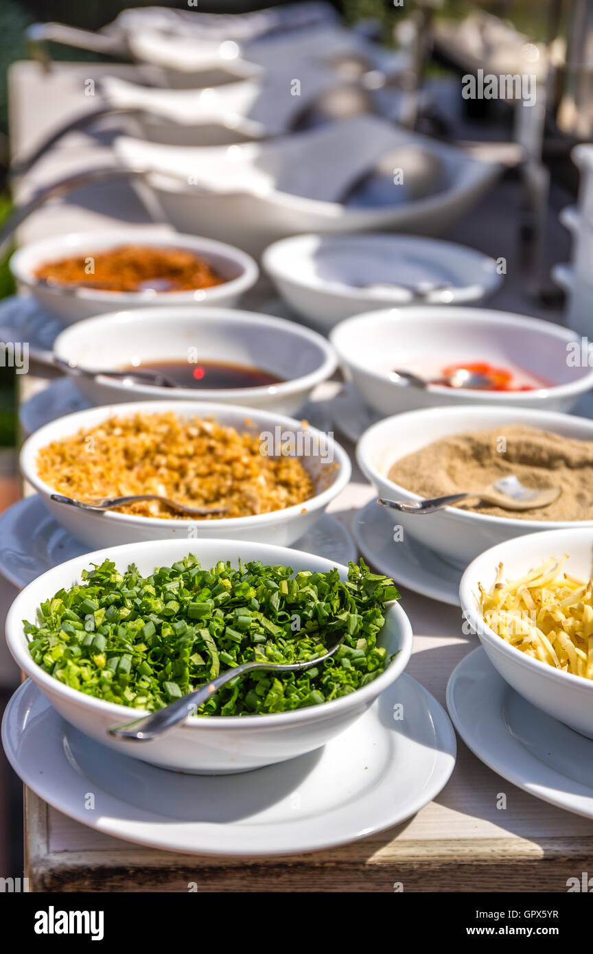 Various kinds of garnish and seasonings for food. Stock Photo