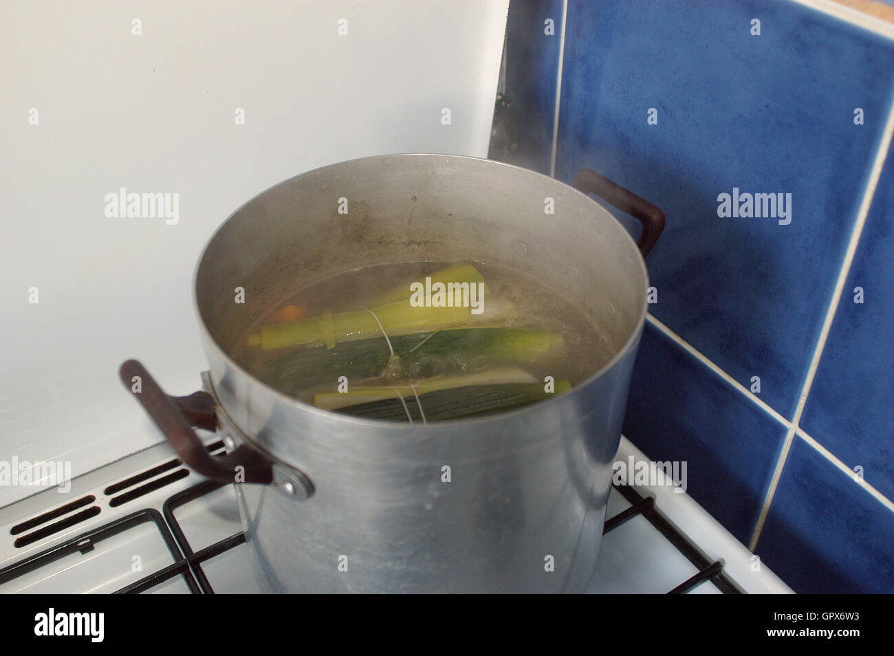 cooking a stew on the stove Stock Photo Alamy