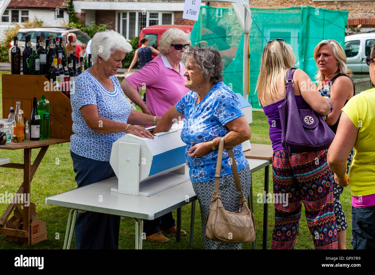 People Play The Tombola At The Annual Alfriston Village Fete, Alfriston, East Sussex, UK Stock Photo