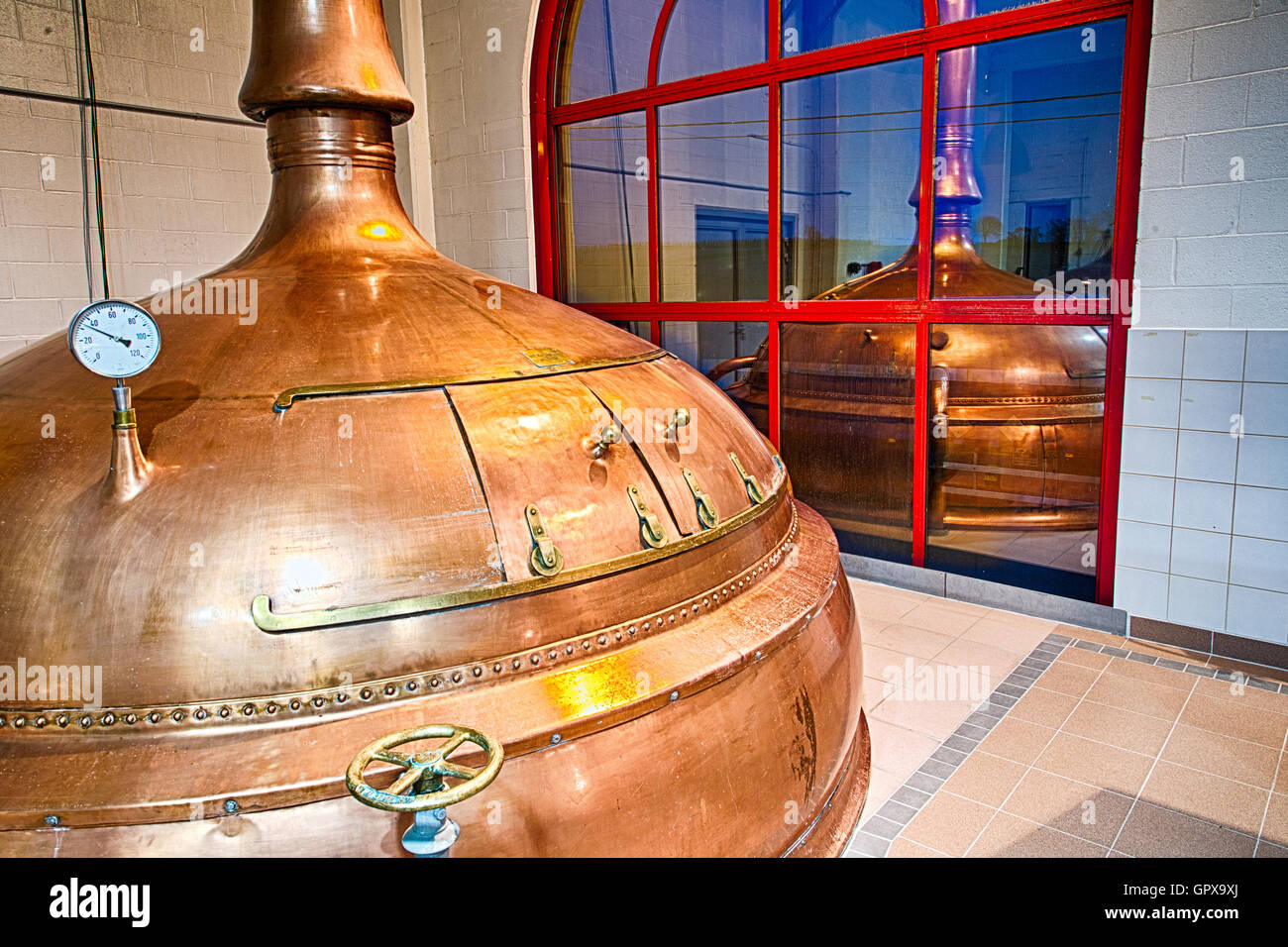 Traditional copper distillery tanks in a beer brewery Stock Photo Alamy