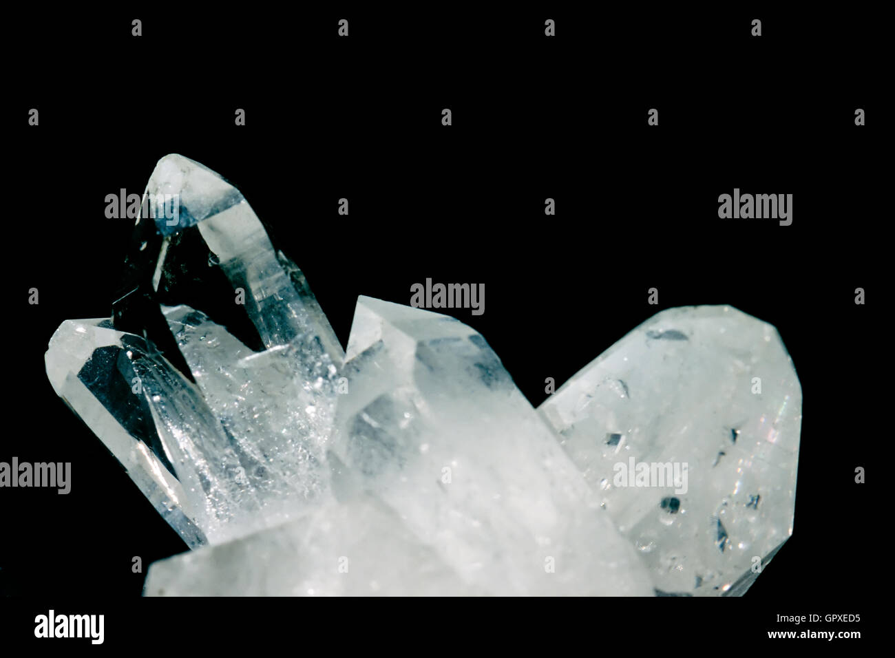 Cluster of rock crystals quartz isolated on black Stock Photo