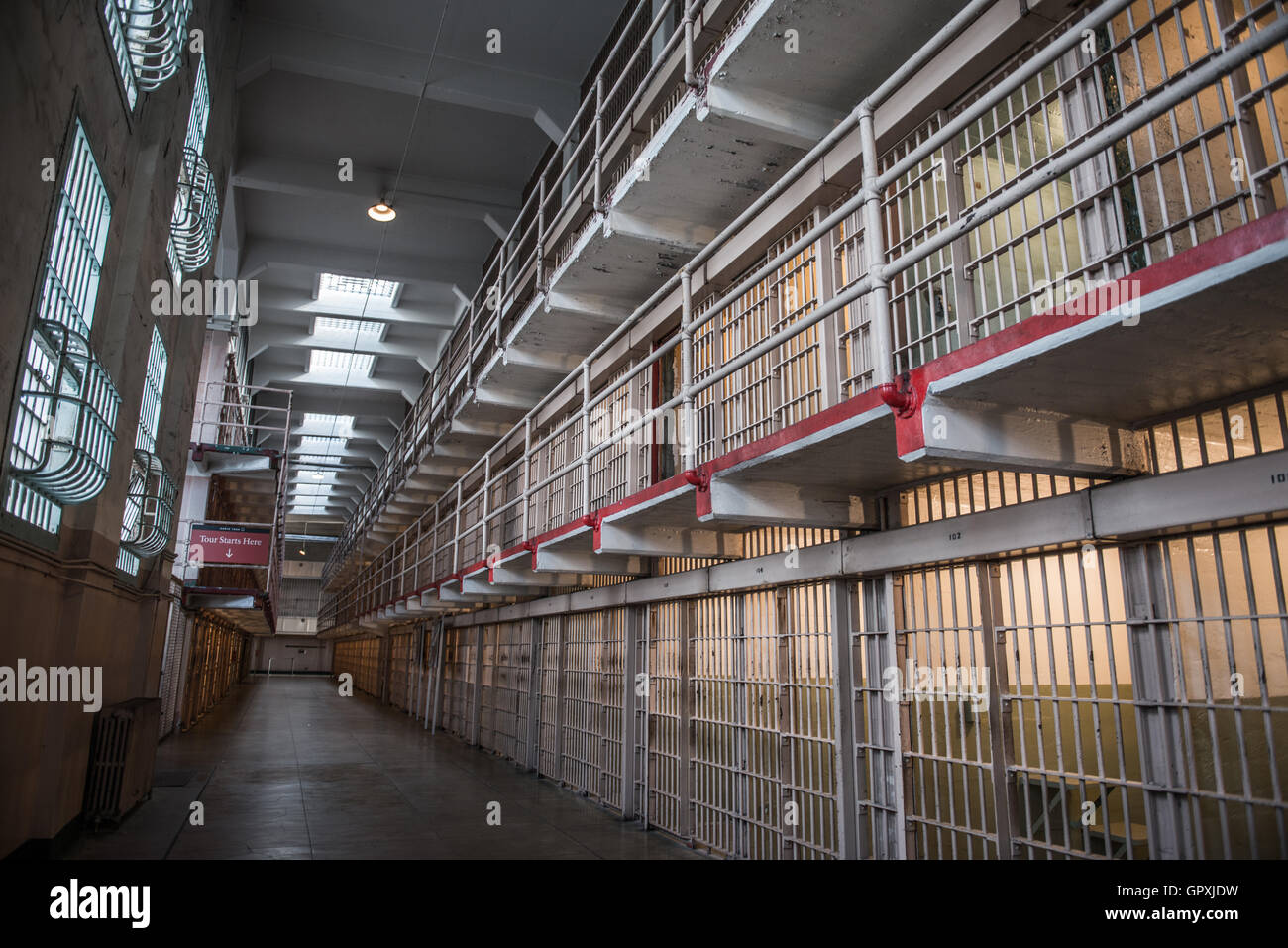 Prison Corridor inside the Alcatraz Penitentiary, with the row of rooms Stock Photo