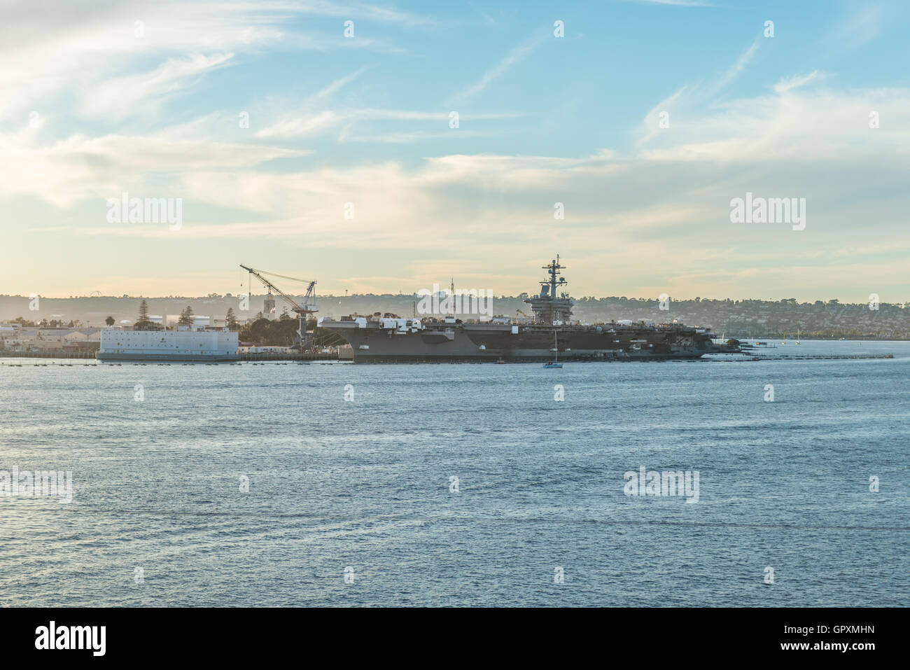 Aircraft carrier docked Navy Pier in San Diego Stock Photo
