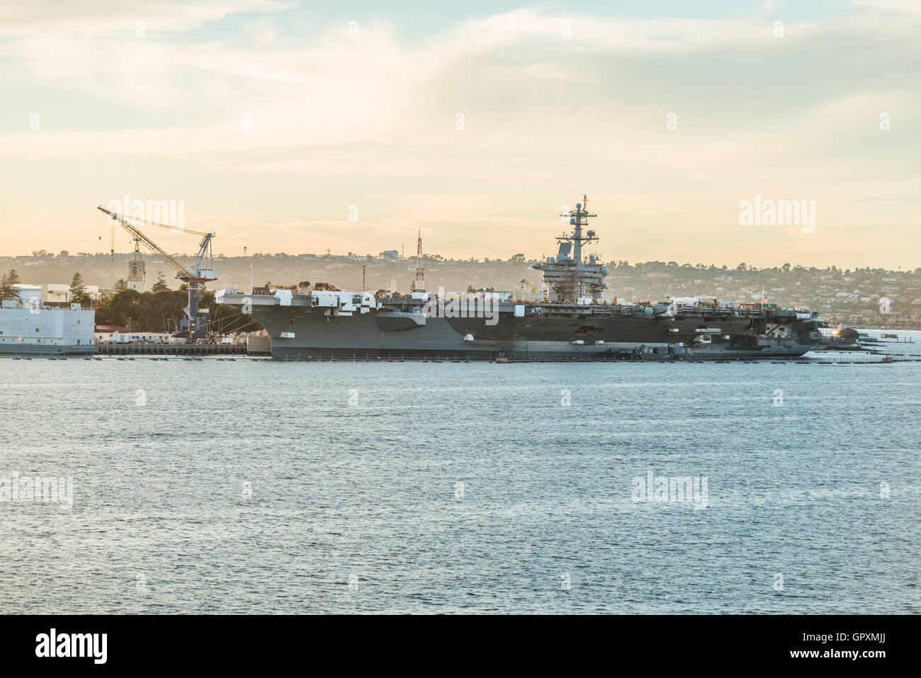 Aircraft carrier docked Navy Pier in San Diego Stock Photo