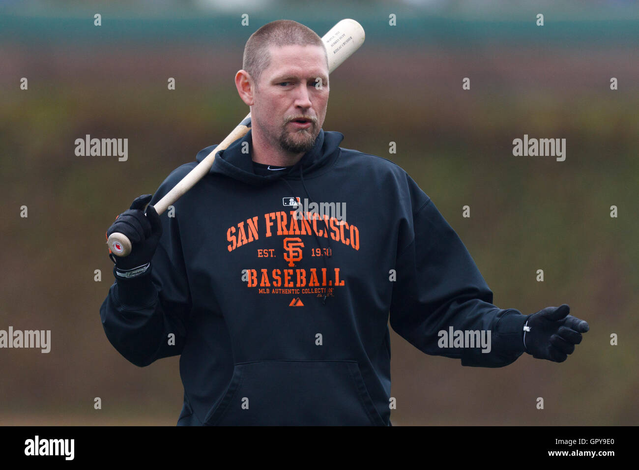 May 14, 2011; Chicago, IL, USA;  San Francisco Giants first baseman Aubrey Huff (17) warms up before the game against the Chicago Cubs at Wrigley Field.  San Francisco defeated Chicago 3-0 in a rain shortened game. Stock Photo