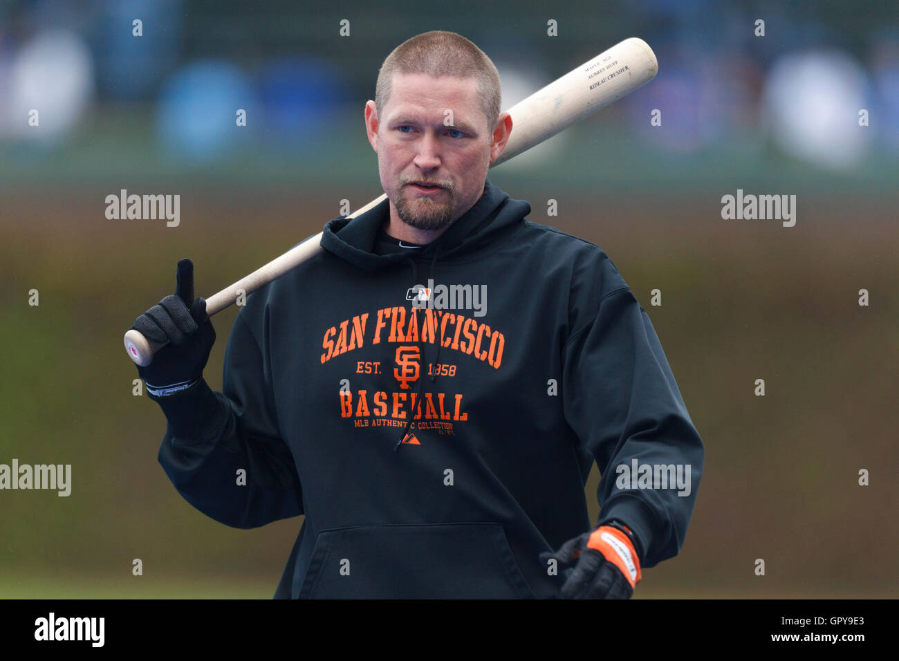 May 14, 2011; Chicago, IL, USA;  San Francisco Giants first baseman Aubrey Huff (17) warms up before the game against the Chicago Cubs at Wrigley Field. Stock Photo