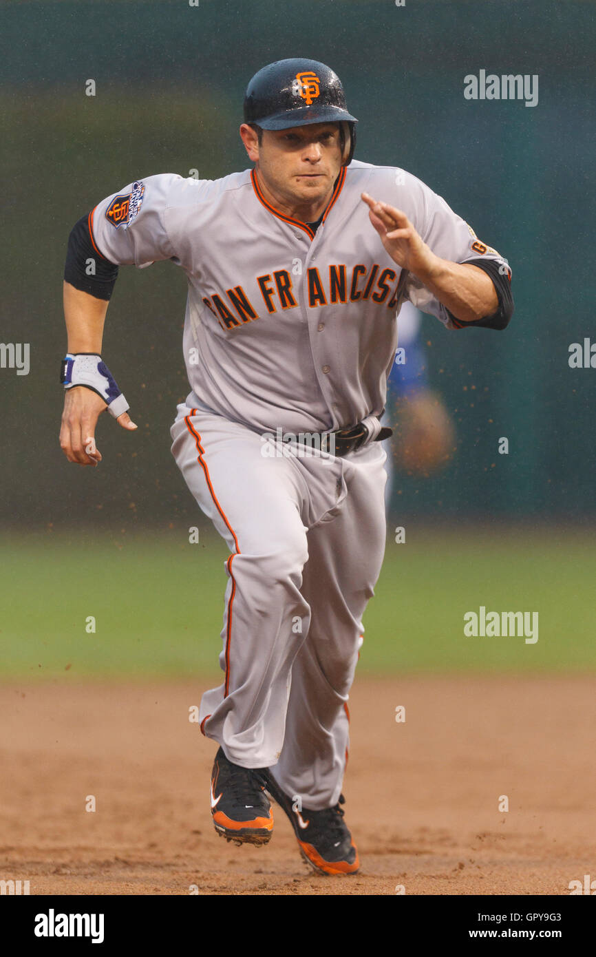 May 14, 2011; Chicago, IL, USA;  San Francisco Giants second baseman Freddy Sanchez (21) runs to third base against the Chicago Cubs during the first inning at Wrigley Field.  San Francisco defeated Chicago 3-0 in a rain shortened game. Stock Photo