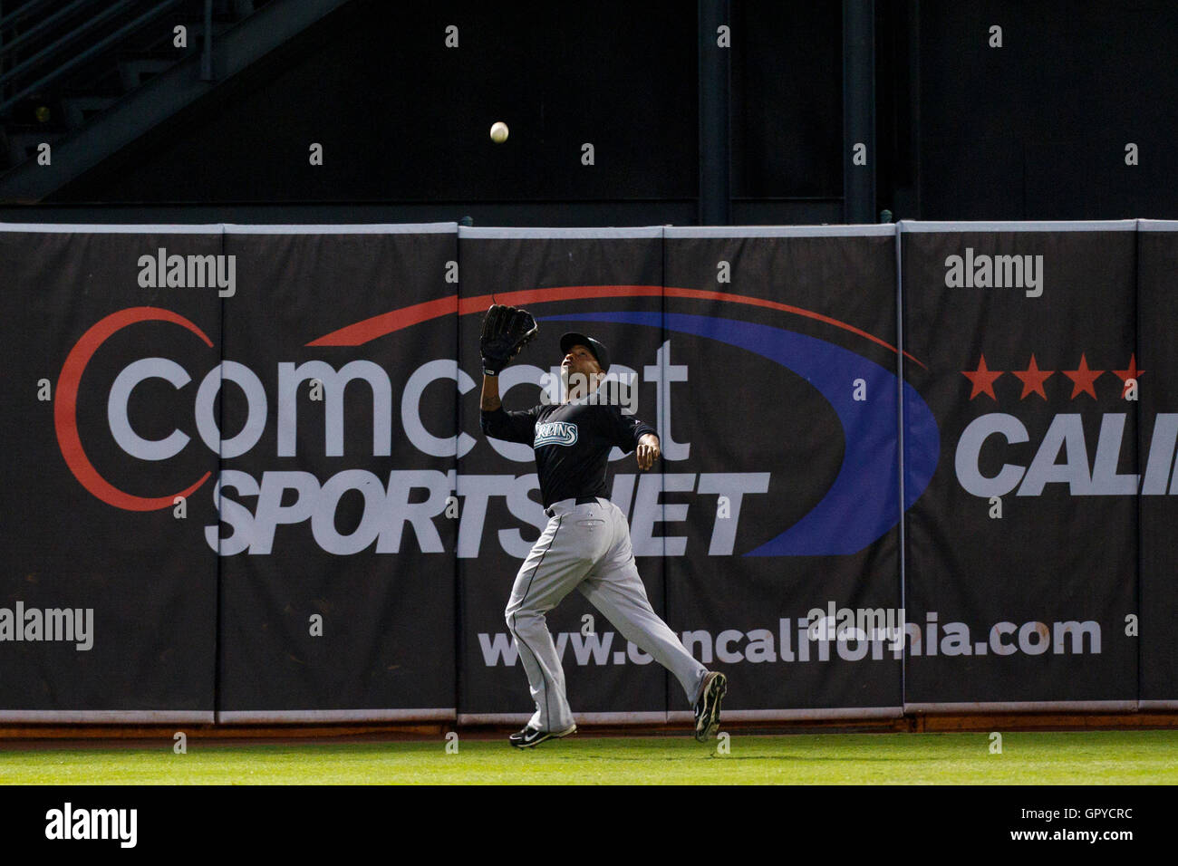 June 28, 2011; Oakland, CA, USA;  Florida Marlins center fielder Dewayne Wise (10) catches a fly ball against the Oakland Athletics during the first inning at the O.co Coliseum. Stock Photo