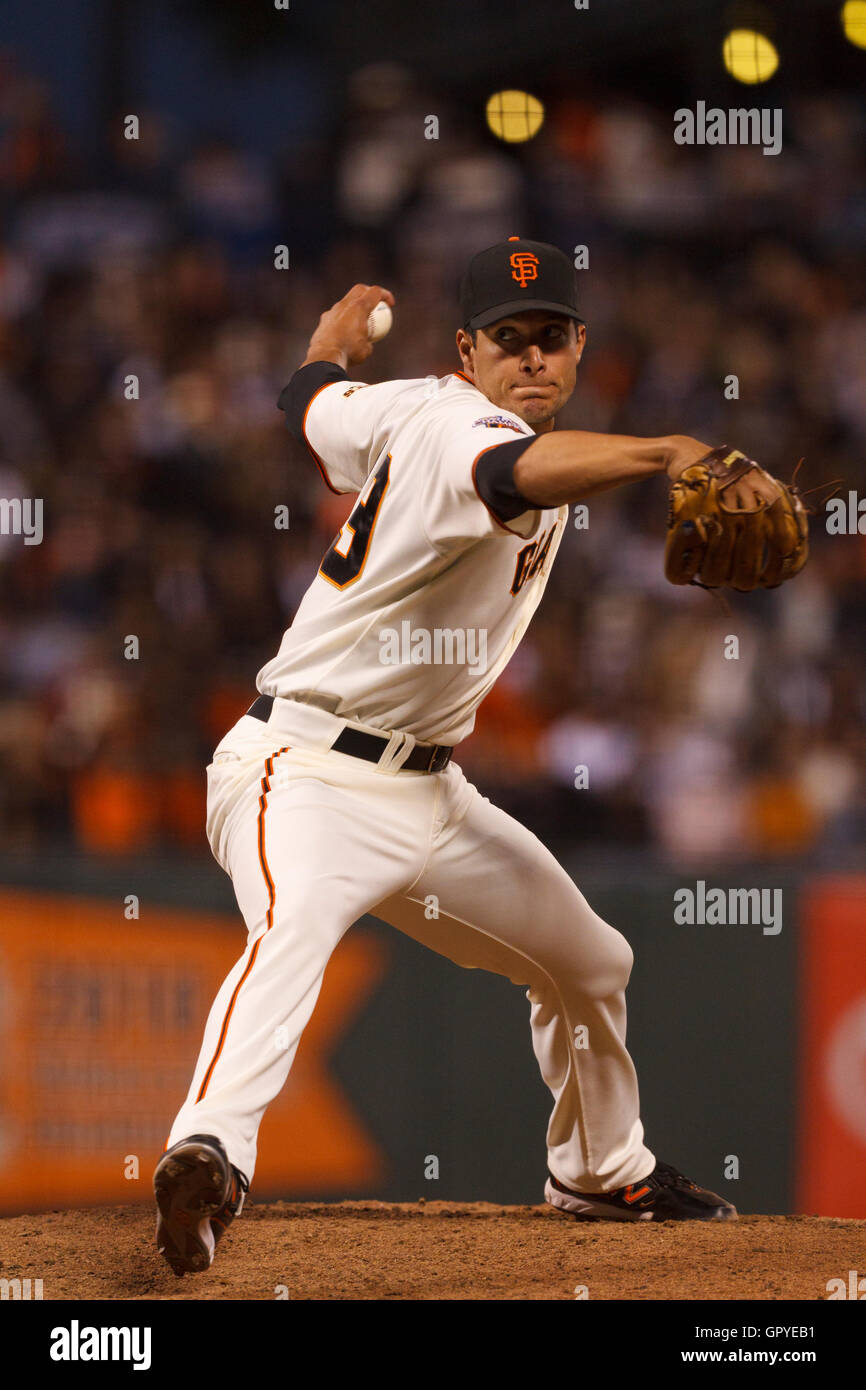 July 23, 2011; San Francisco, CA, USA;  San Francisco Giants relief pitcher Javier Lopez (49) pitches against the Milwaukee Brewers during the eighth inning at AT&T Park. Stock Photo