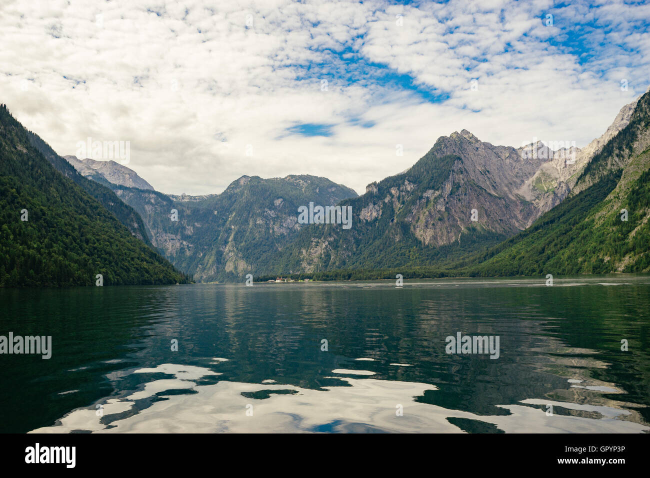 Lake Konigssee against scenic cloudscape, Berchtesgadener Land, Bavaria, Germany Stock Photo