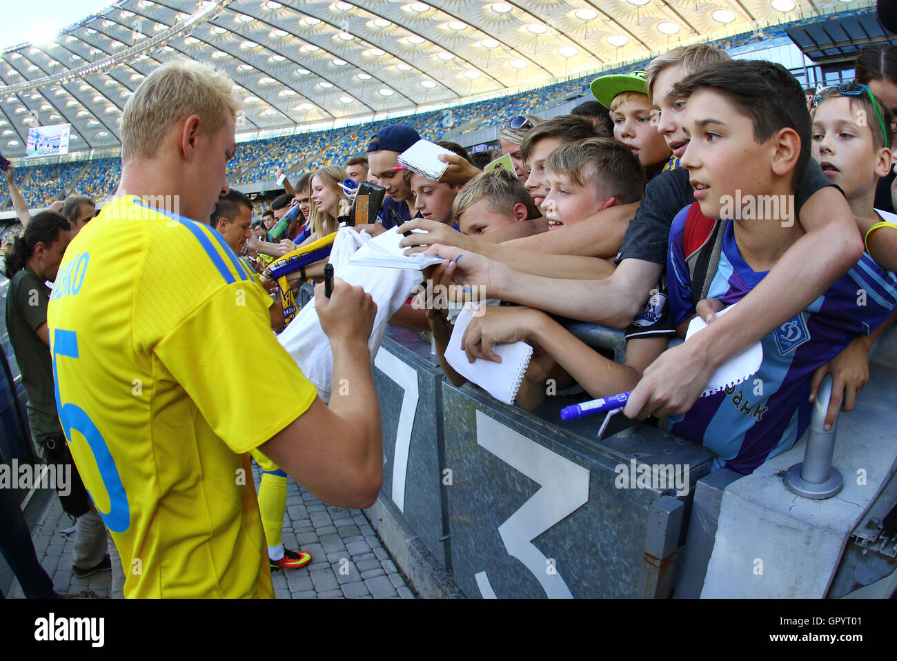 KYIV, UKRAINE - AUGUST 29, 2016: Player Viktor Kovalenko gives an autographs during Open training session of Ukraine National Football Team before FIFA World Cup 2018 Qualifying matches Stock Photo