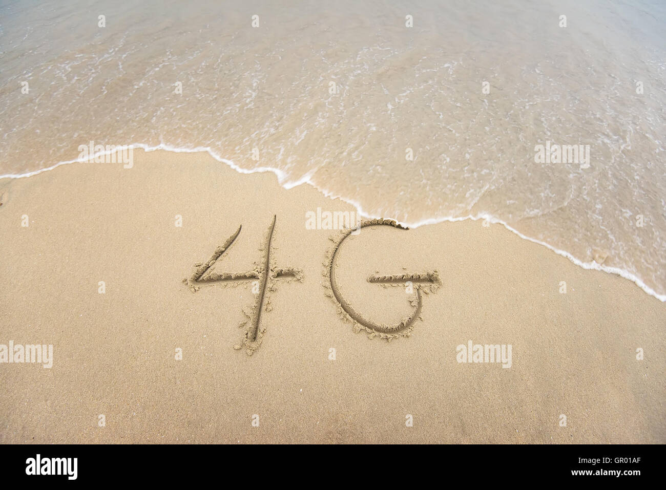 4G written in the sand Stock Photo