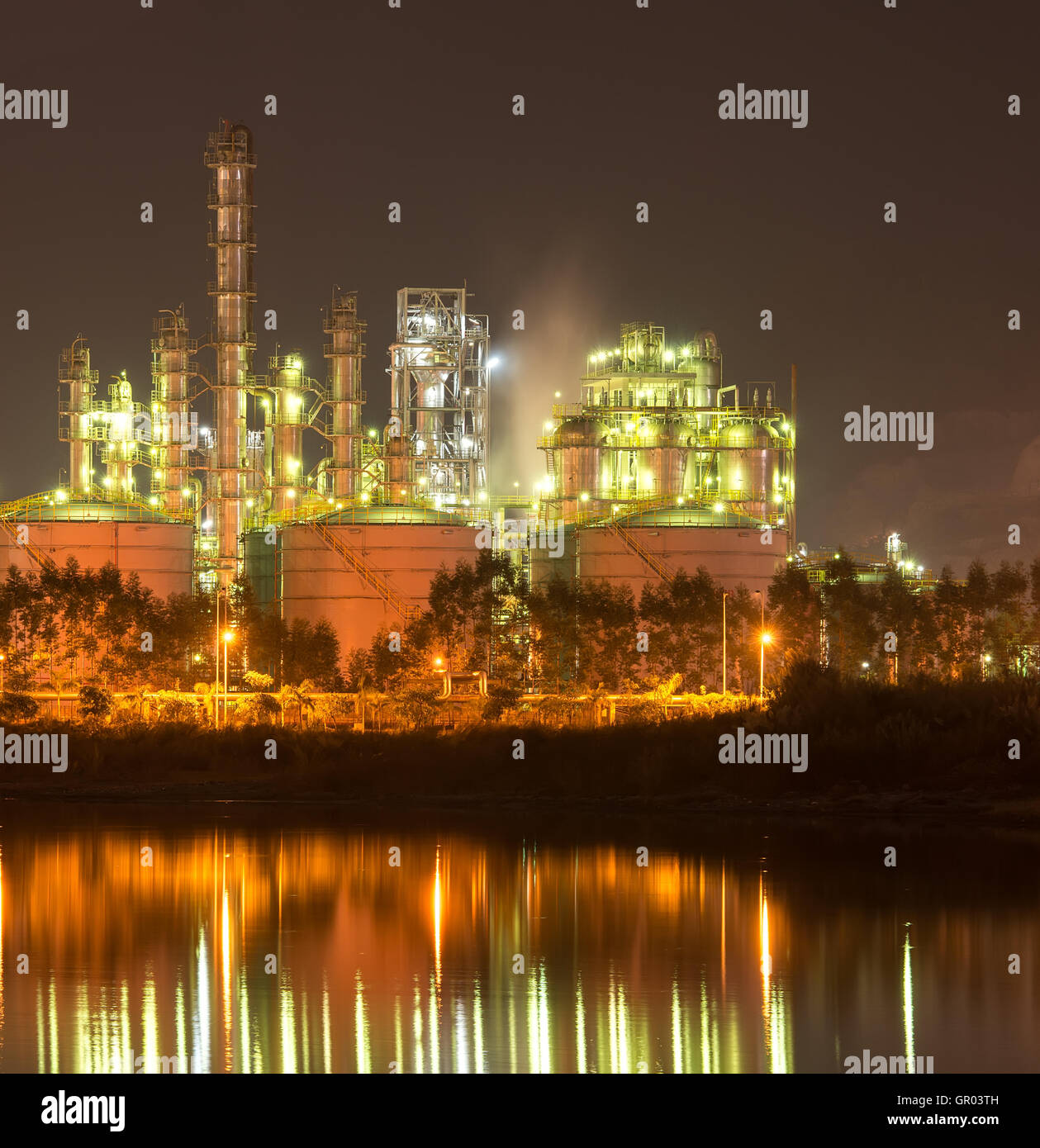 Refinery industrial plant with Industry boiler at night Stock Photo - Alamy