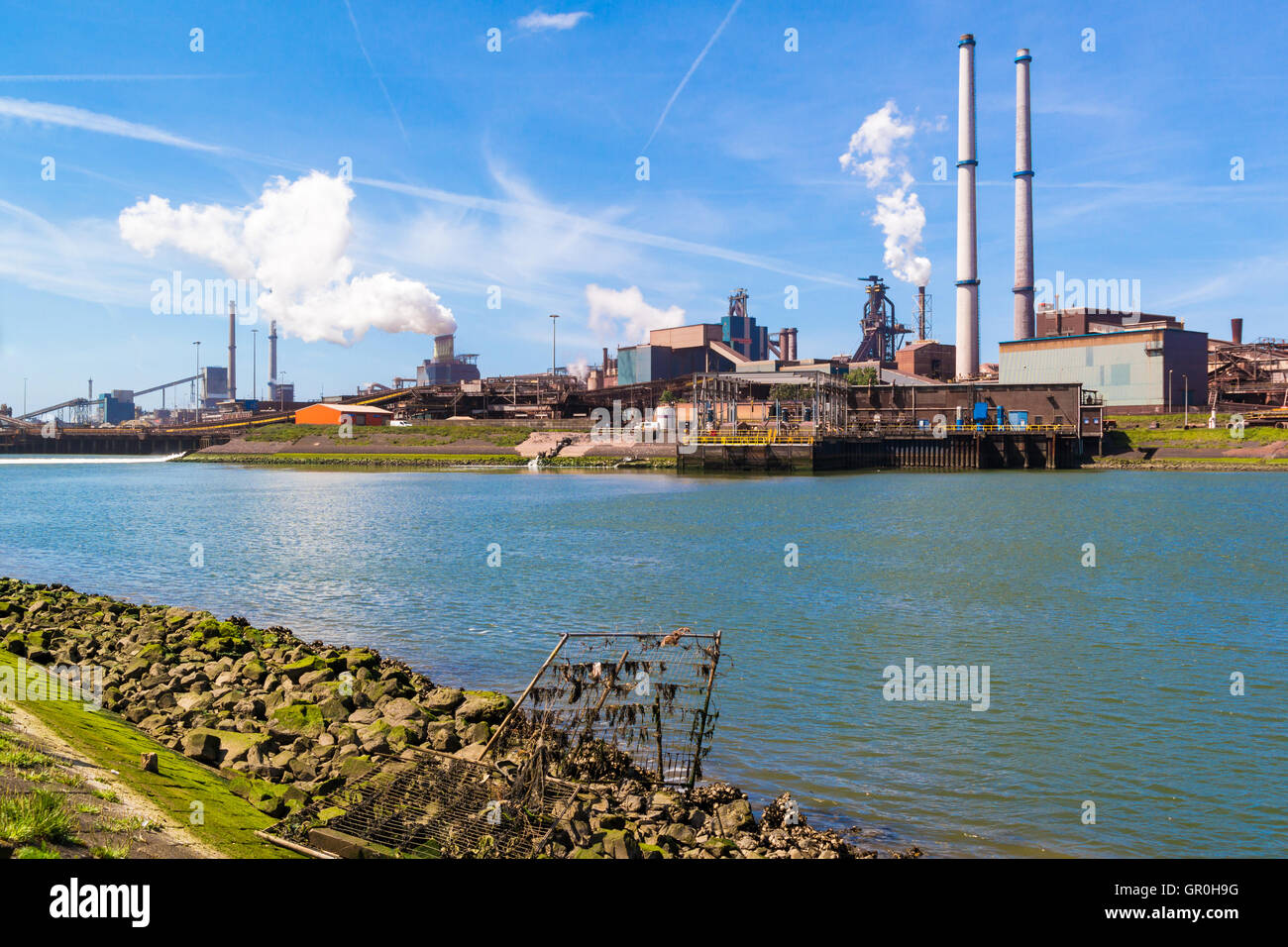 Steel making industry and North Sea Canal in IJmuiden near Amsterdam in Netherlands Stock Photo