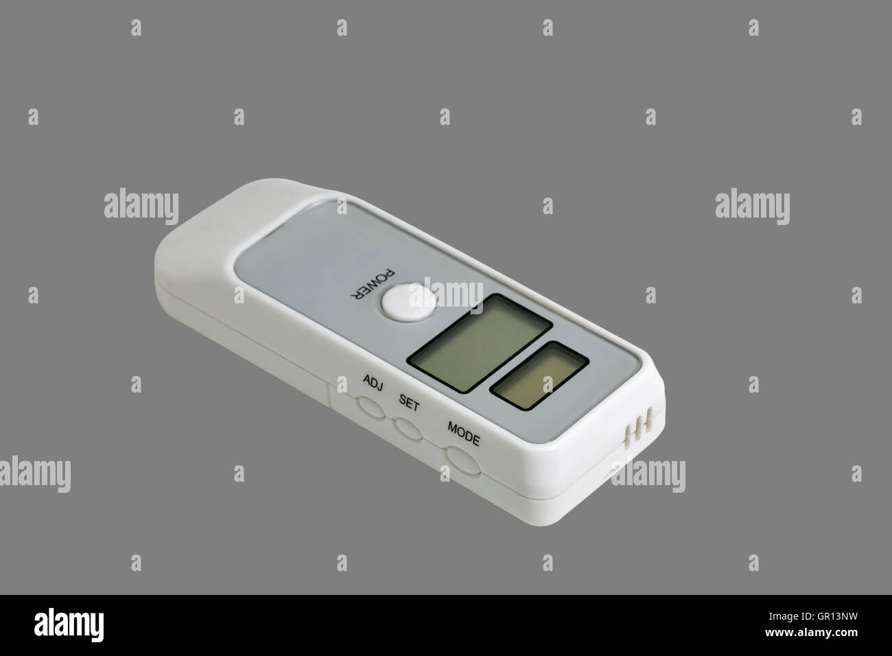 portable breath alcohol tester isolated on gray background closeup Stock Photo