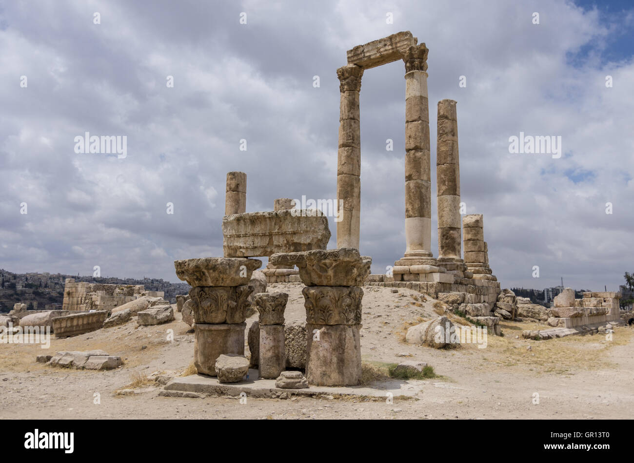 Ruins of roman Temple of Hercules on the Amman citadel with city view, Amman. Jordan Stock Photo