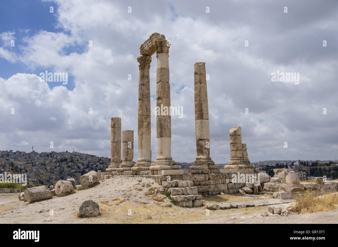Ruins of roman Temple of Hercules on the Amman citadel with city view, Amman. Jordan Stock Photo