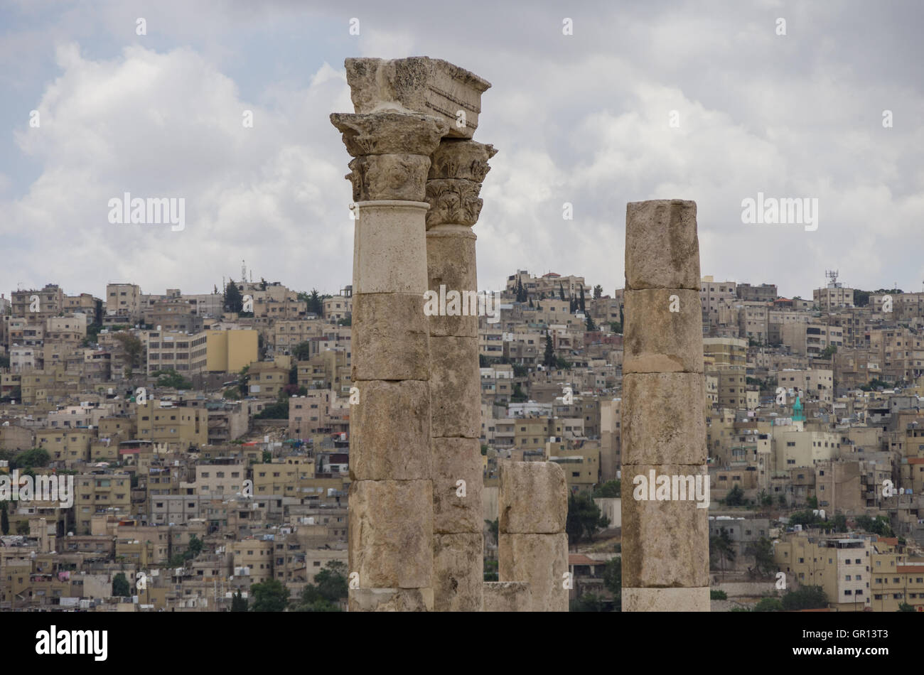 Ruins of roman Temple of Hercules on the Amman citadel with city view, Amman. Jordan Stock Photo