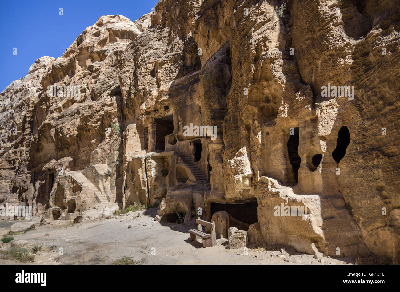 Cave tombs in Nabataean city of the Siq al-Barid in Jordan. It is known as the Little Petra Stock Photo