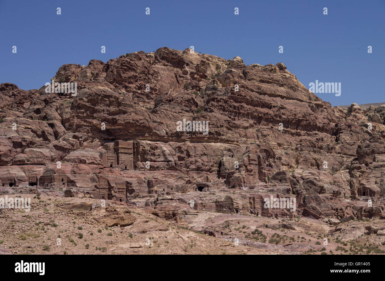 Cave tombs in Jebel Madbah mountain. Petra, Jordan Stock Photo
