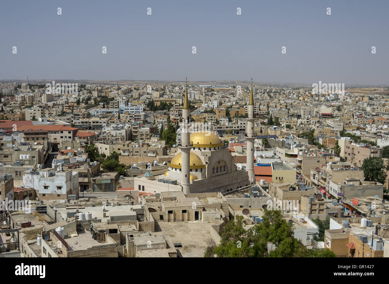 Madaba, Jordan - June 3, 2016: Panoramic view over the town center of Madaba in Jordan with the Central Mosque Stock Photo