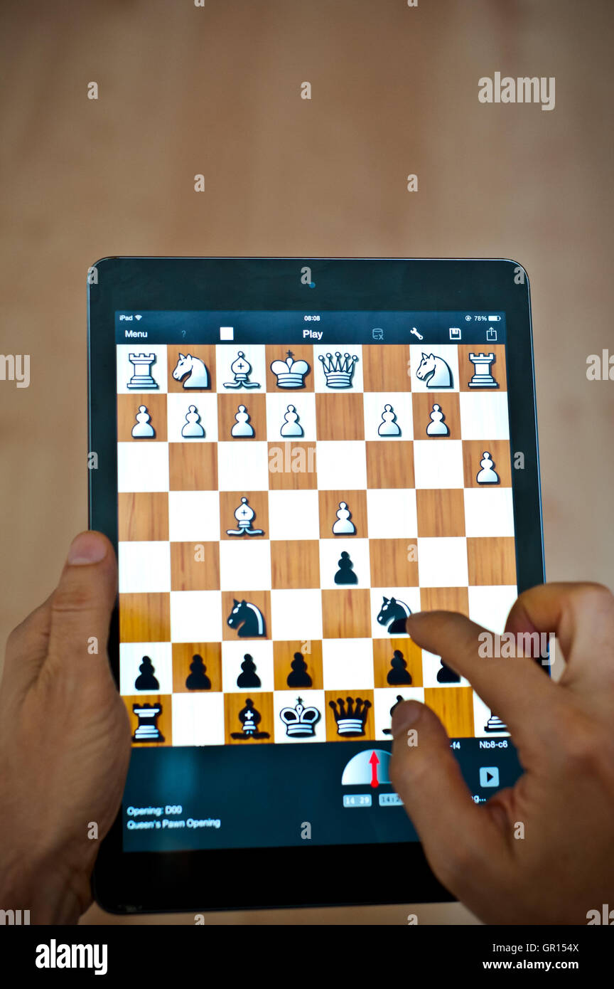 playing a chess game on iPad tablet Stock Photo - Alamy