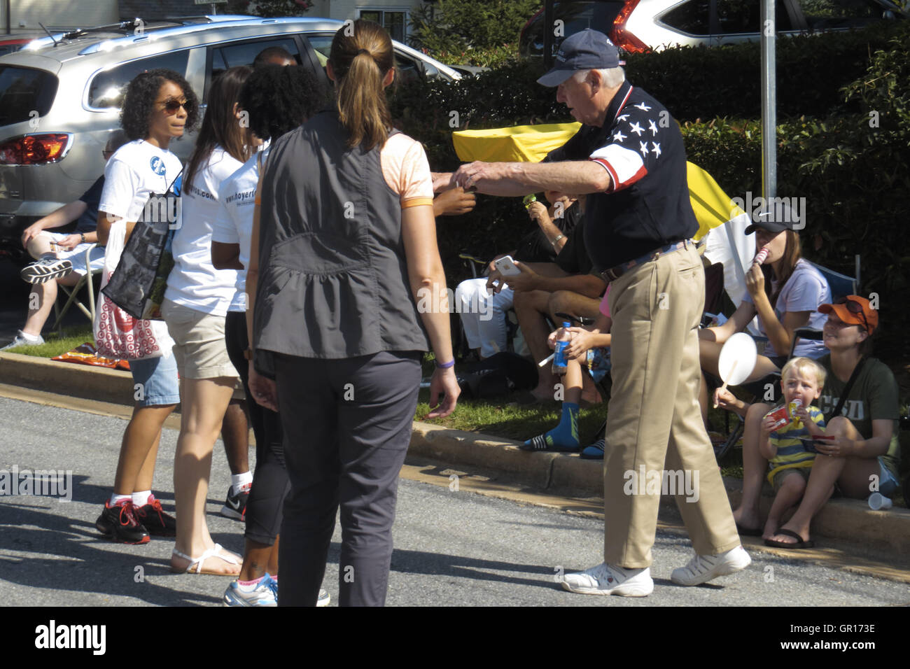 Greenbelt, Maryland, USA. 5th Sep, 2016. Steny Hoyer, United States Representative for Maryland's 5th congressional district, seen handing lemonade to other participants in the 61st Annual Greenbelt Labor Day Parade, as it moved down Crescent Road in Greenbelt, MD. Credit:  Evan Golub/ZUMA Wire/Alamy Live News Stock Photo