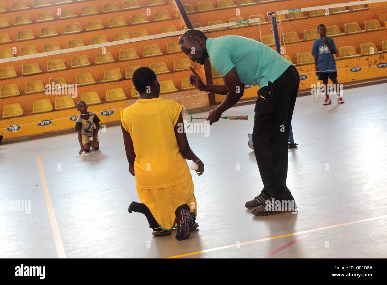 Kampala, Uganda. September 6, 2016. A disabled badminton player receives tip  from a coach during a clinic in the Uganda capital. Credit: Samson  Opus/Alamy Live News Stock Photo - Alamy