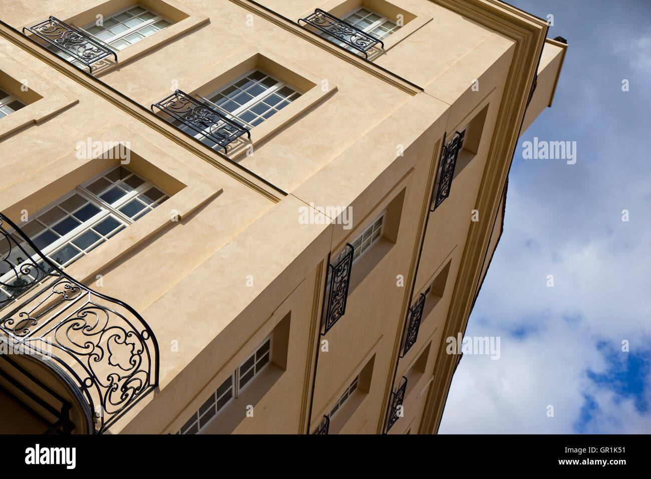 Facade and wrought iron balconies of a stylish French building Stock ...