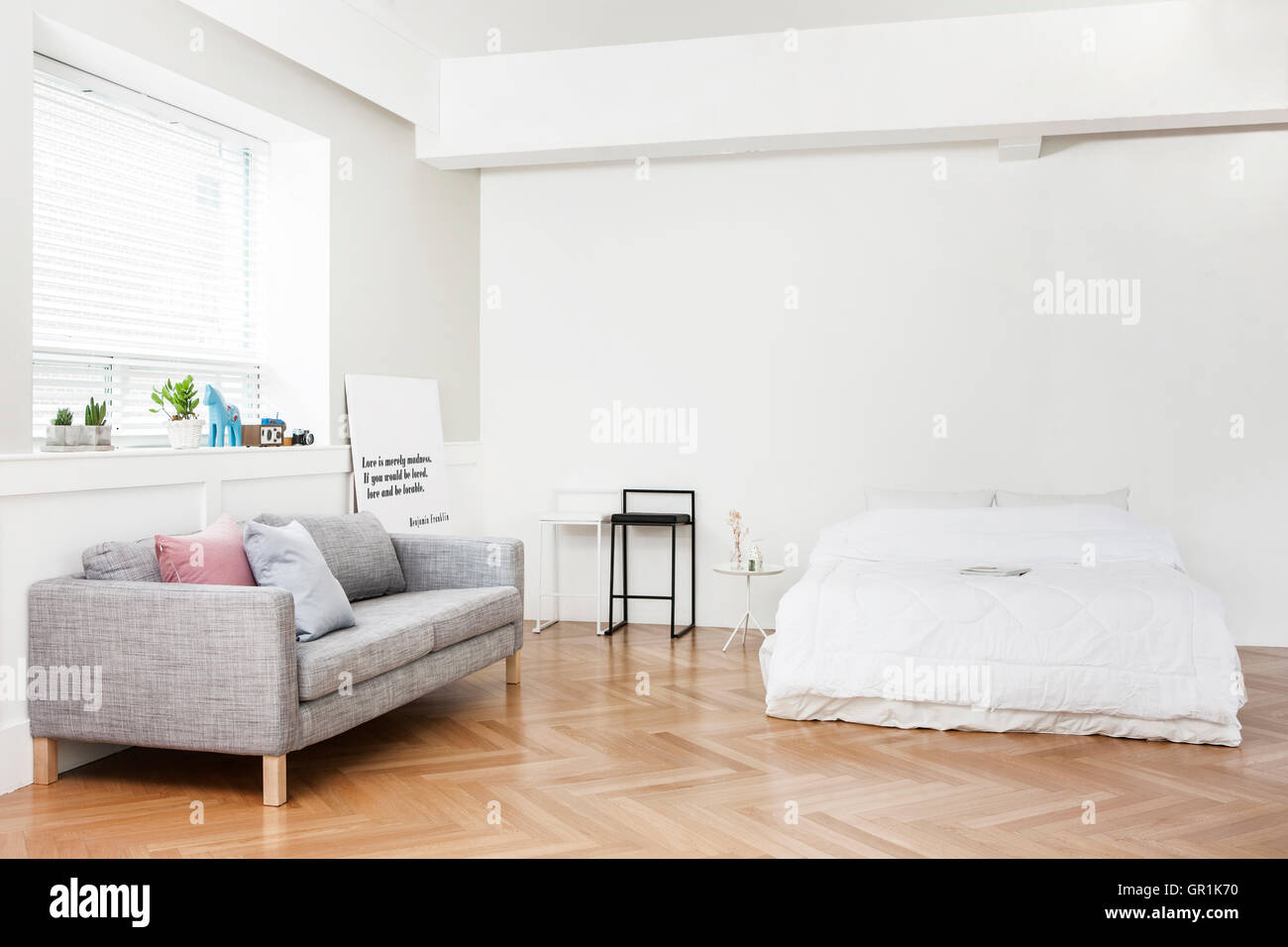 Interior with sofa and bed Stock Photo Alamy